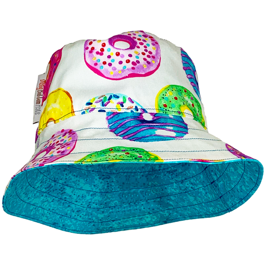Dusty Bottom Hats "Donuts"Donuts https://dustybottomhats.myshopify.com/products/donuts-1 Our Hats are made from locally sourced materials. Handmade to give quality assurance and perfect fit for all sizes. Using All Cotton for easy care and long lasting protection against the harsh suns during outside activity