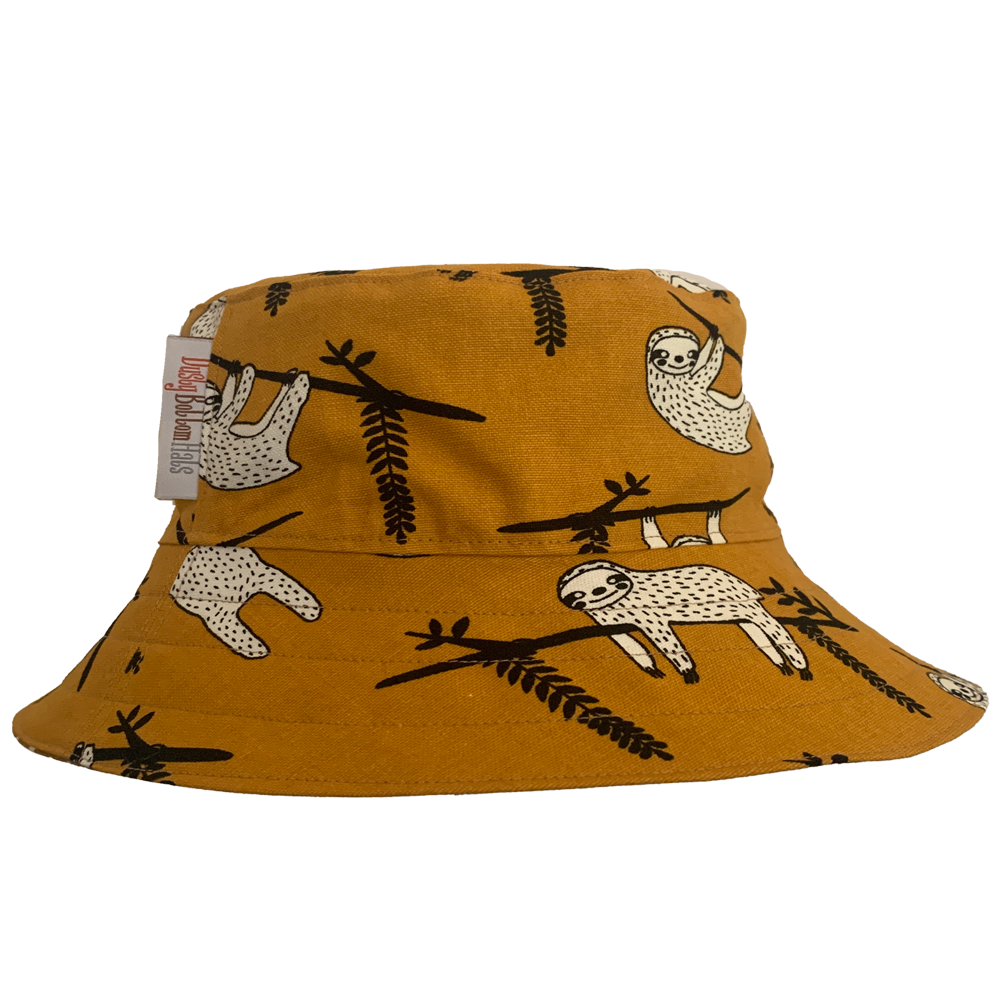 White Sloths  https://dustybottomhats.myshopify.com/products/copy-of-spring-bucket-hat  Our Hats are made from locally sourced materials. Handmade to give quality assurance and perfect fit for all sizes. Using All Cotton for easy care and long-lasting protection against the harsh suns during outside activity. How to Measure