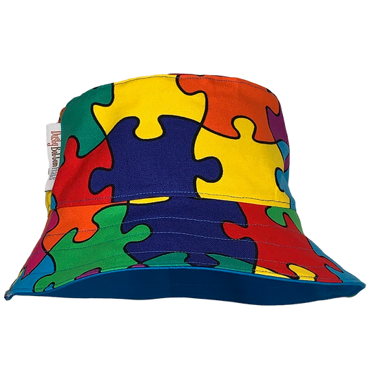 Dusty Bottom Hats "JigSaw"JigSaw  https://dustybottomhats.myshopify.com/products/jigsaw  Our Hats are made from locally sourced materials. Handmade to give quality assurance and perfect fit for all sizes. Using All Cotton for easy care and long lasting protection against the harsh suns during outside activity. 