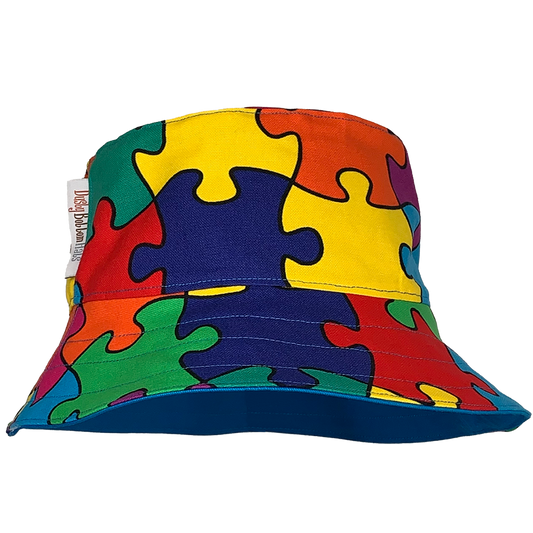 Dusty Bottom Hats "JigSaw"JigSaw  https://dustybottomhats.myshopify.com/products/jigsaw  Our Hats are made from locally sourced materials. Handmade to give quality assurance and perfect fit for all sizes. Using All Cotton for easy care and long lasting protection against the harsh suns during outside activity.